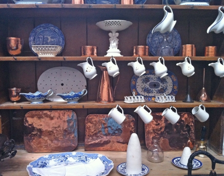 Shining examples/ serve it all up with dainty blue Royal Doulton and beaten copper.