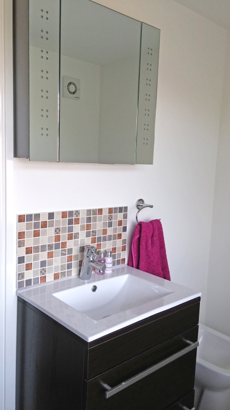 holly ensuite basin tiles and cupboard